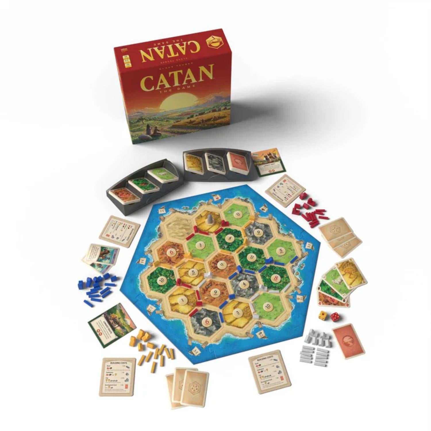 Catan board game set with components on a white background