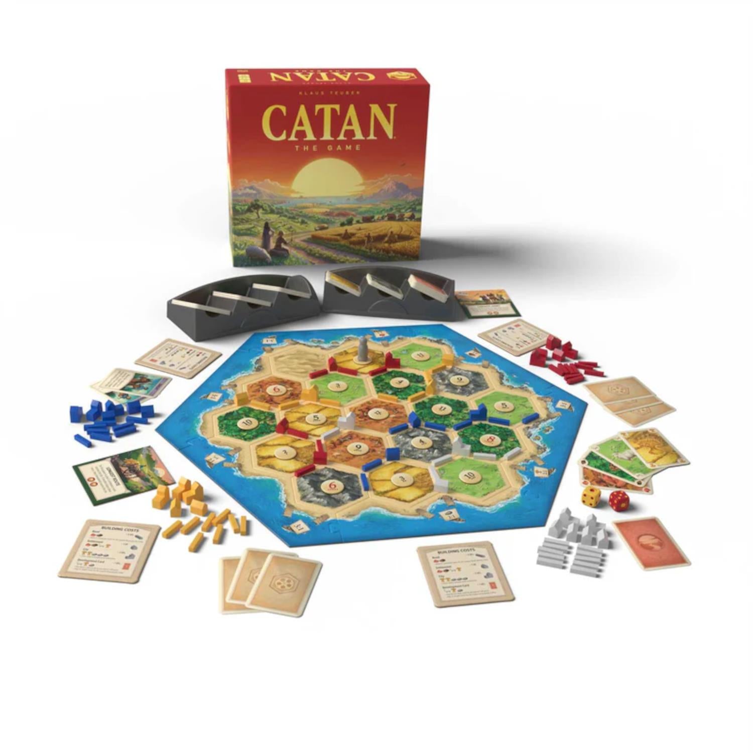 Catan board game set with components on a white background